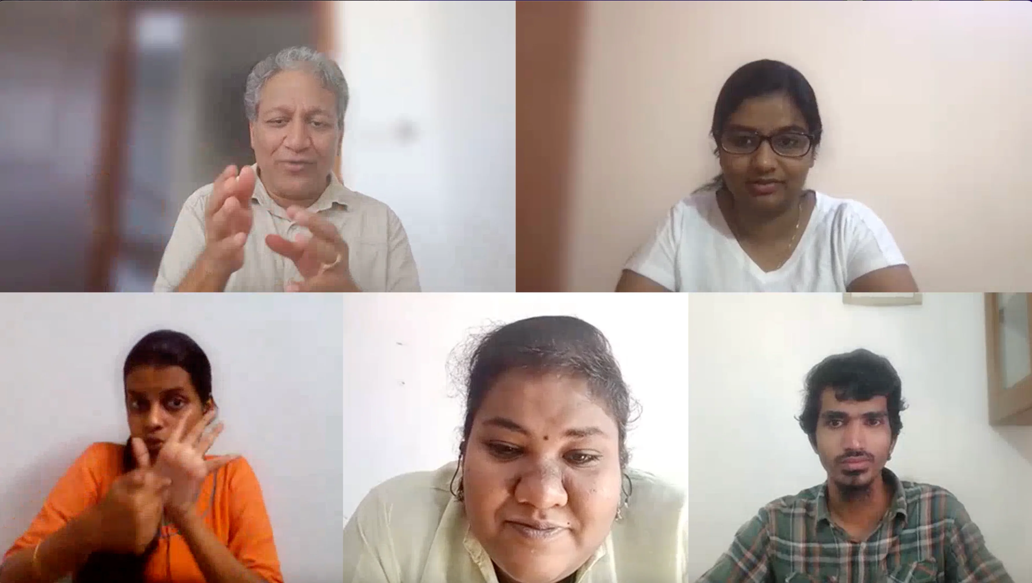 Deaf interns and hearing participants playing an ISL Taboo game via Zoom.