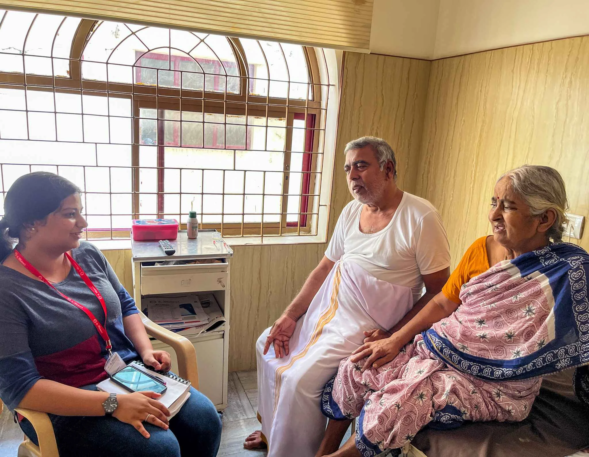 Engaging in a discussion with an in-patient during an interview session